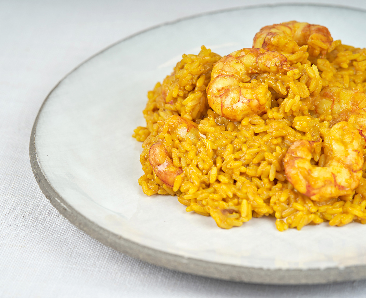Gambón al curry con arroz